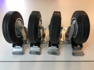 Beautifully robust set of 4 swivel castors with brake and rubber wheel covers.